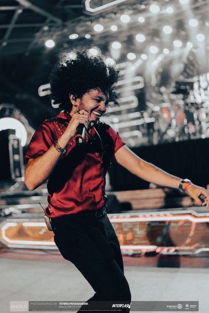 Funk Island dancer performing under stage lights